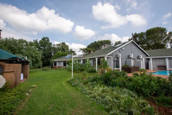 Main building and pool viewed from the garden